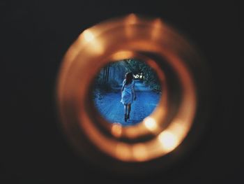 Reflection of man on mirror