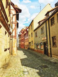 Street in town against sky