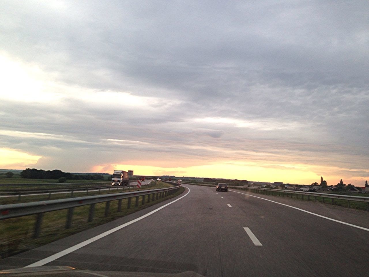 the way forward, transportation, road, sky, road marking, cloud - sky, diminishing perspective, vanishing point, sunset, cloudy, cloud, country road, street, empty road, dramatic sky, highway, empty, overcast, nature, car