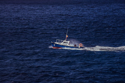 Boat sailing in sea