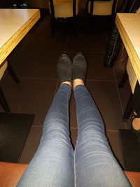 Low section of woman standing on floor