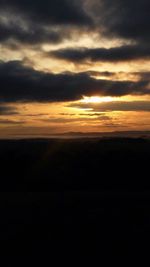 Scenic view of landscape at sunset