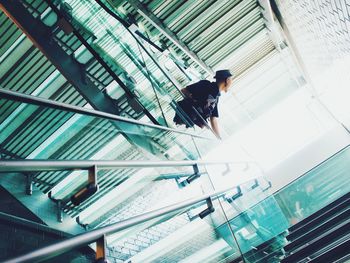 Low angle view of person walking on staircase