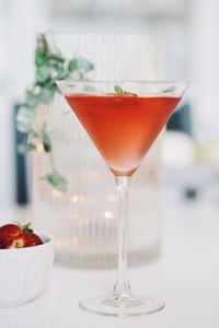 Close-up of cocktail in glass on table