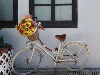 Bicycle parked against wall