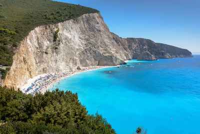 Scenic view of sea against clear blue sky