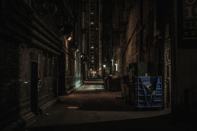 Alley in city at night