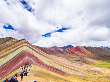 Scenic view of mountain against cloudy sky