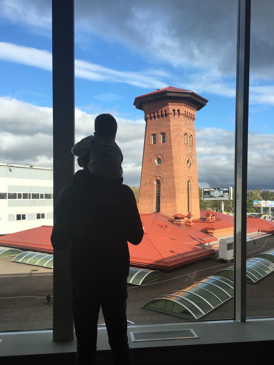 one person, sky, rear view, architecture, city, built structure, building exterior, cloud - sky, real people, men, outdoors, only men, day, one man only, people, adults only, adult