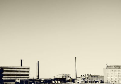 Cityscape against clear sky