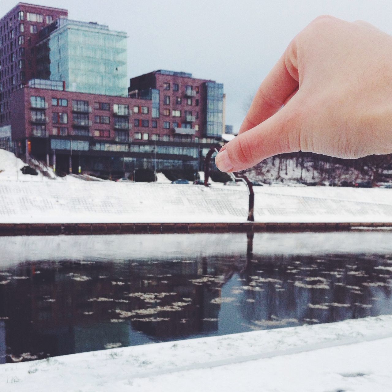 building exterior, architecture, built structure, winter, snow, cold temperature, water, city, season, weather, frozen, residential building, part of, unrecognizable person, person, residential structure, building, day