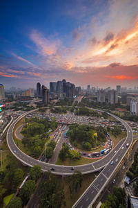 Aerial view of elevated road against sky during sunset