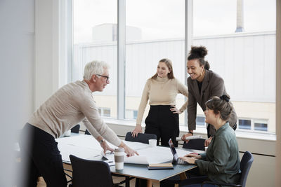 Architects having meeting in office