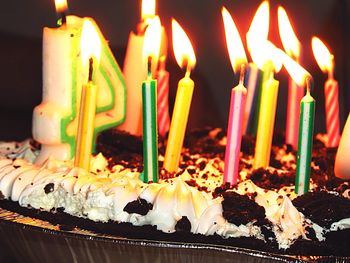 Close-up of burning candles