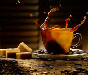 Close-up of coffee served on table