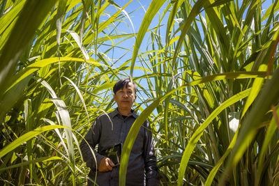 Full length of man standing in farm