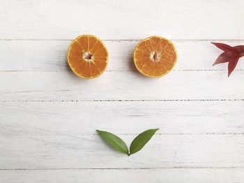 High angle view of orange leaves on table