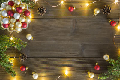 Illuminated christmas tree on table