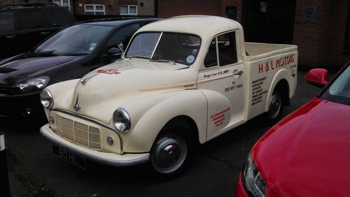 Vintage car parked on street in city