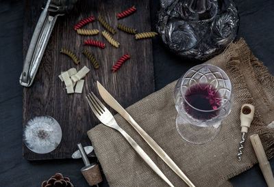 High angle view of wine in glass on table