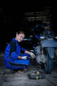 Portrait of senior man working at construction site