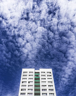 Digital composite image of modern building against sky