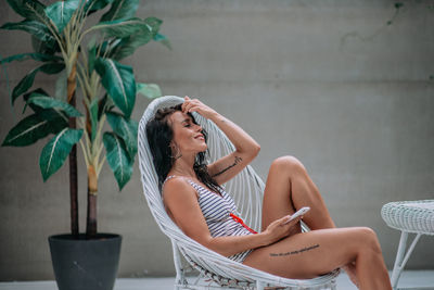 Woman sitting on chair