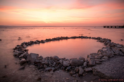 Scenic view of sea during sunset