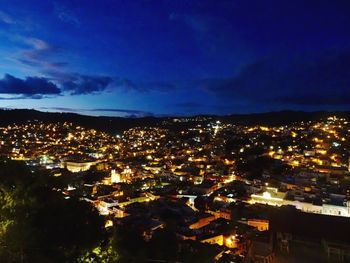 Illuminated cityscape at night