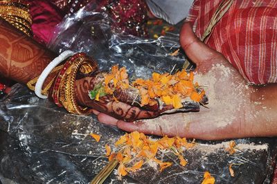 Cropped image of messy hands during wedding ceremony