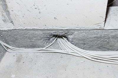 Close-up of rope tied on wall