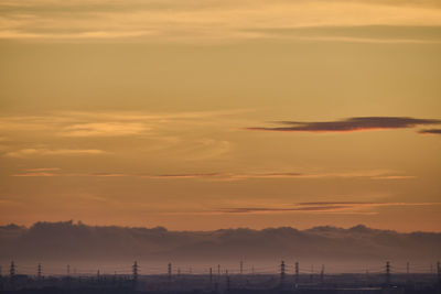 Scenic view of silhouette landscape against sky during sunset