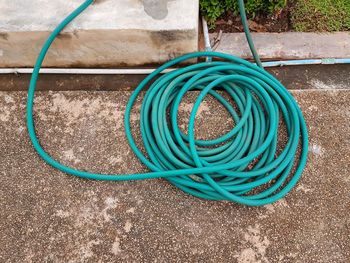 High angle view of blue pipe on table