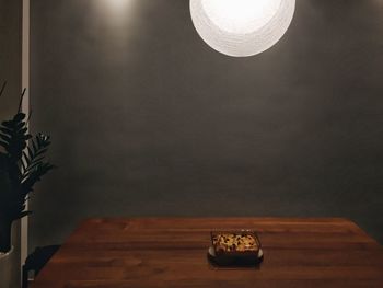Close-up of illuminated table