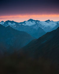 Scenic view of mountains against sky during sunset