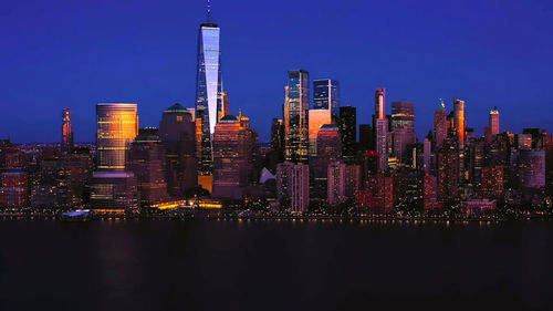 Illuminated buildings in city at night