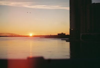 Scenic view of sunset over river