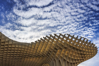 Low angle view of roof of building against sky