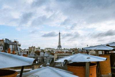 View of city against cloudy sky