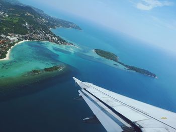 High angle view of island in sea against sky