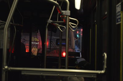 Close-up of illuminated lighting equipment on window