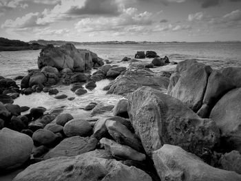 Scenic view of sea against cloudy sky