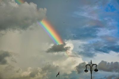 Low angle view of rainbow in sky