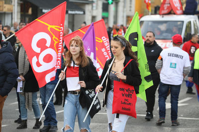 Group of people walking on street