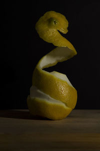 Close-up of lemon slice on table
