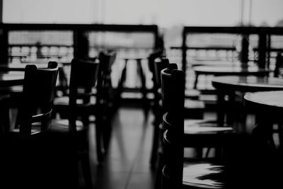 Empty chairs and table in restaurant