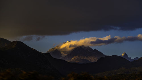 Scenic view of mountains against sky during sunset