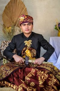 Men in traditional balinese clothes