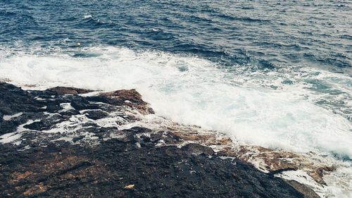 High angle view of rocky coastline