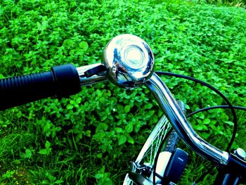 Close-up of bicycle on grass